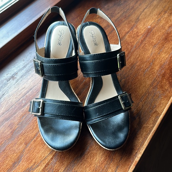 Black slip on heels with a cork sole. - Picture 2 of 3
